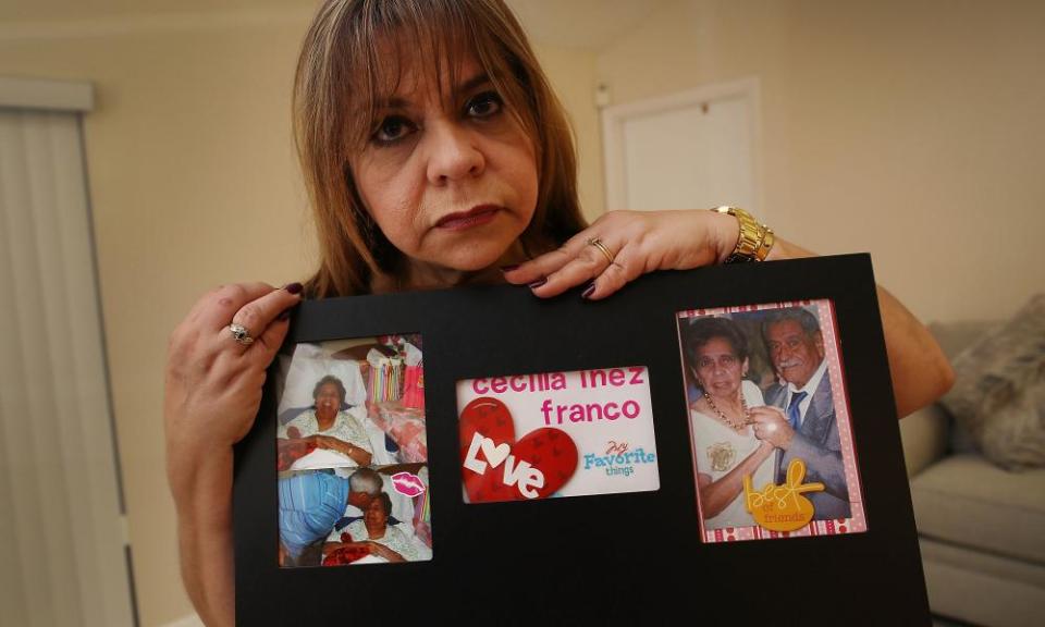 Margarita Navarro displays photographs of her parents.