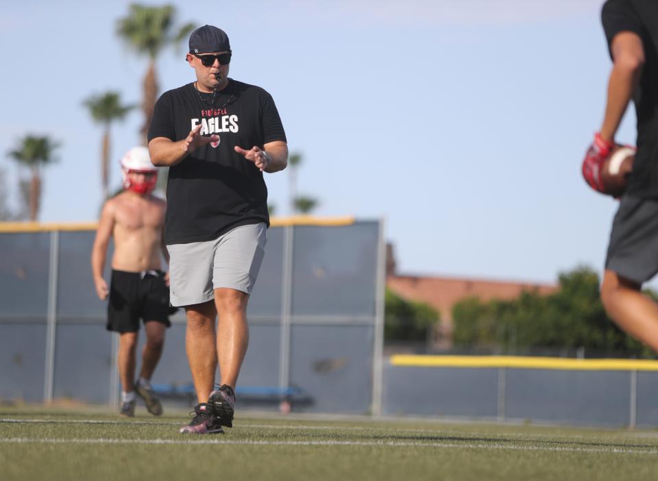 Head coach Mike Sheahan coaches football players through practice at Scottsdale Christian High School in Paradise Valley on July 24, 2023.