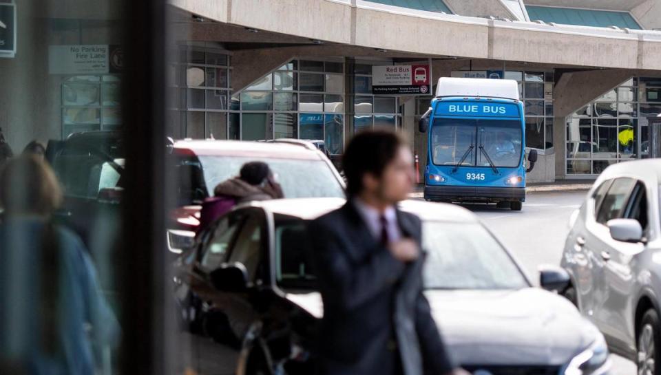 The Blue Bus, an economy parking lot shuttle, arrives at Kansas City International Airport’s Terminal B on Thursday, Dec. 1, 2022, in Kansas City.