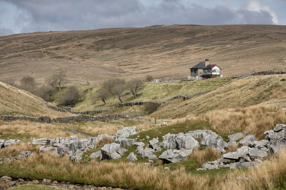 Three Blea Moor Cottages has no mains electricity or water. (SWNS)