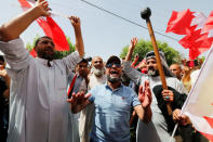 Supporters of Iraqi Shi'ite cleric Moqtada al-Sadr shout slogans during a demonstration in front of the Bahraini embassy in Baghdad,Iraq , May 24, 2017. REUTERS/Wissm al-Okili