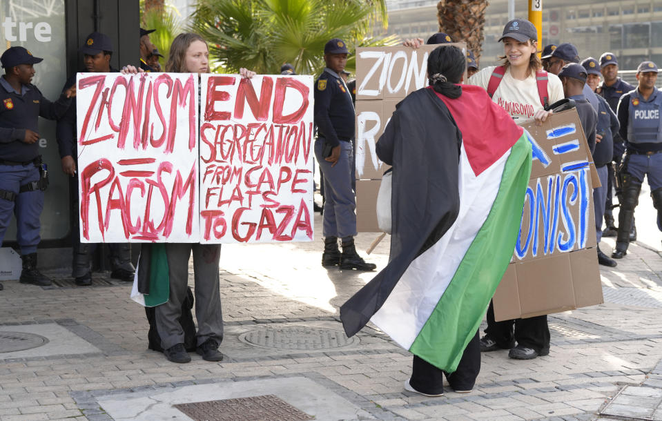 A protest in support of Palestinians takes place in Cape Town, South Africa, Friday June 14, 2024 as Parliament sits for the first time since general elections last month. South African President Cyril Ramaphosa was expected to be reelected for a second term Friday after his African National Congress party signed a last-minute coalition agreement with its long-time political rival during the first sitting of the new Parliament. (AP Photo/Nardus Engelbrecht)