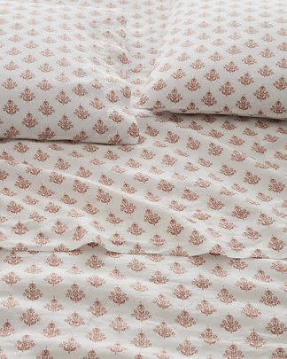 An assortment of sheets in ditsy floral prints