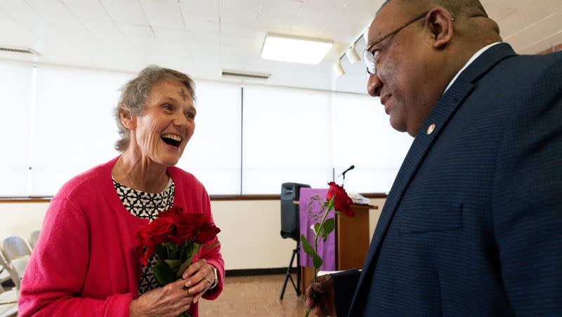 Susan Murphy gives Pastor Alex Brown a rose for Valentine’s Day after an Ash Wednesday service at Provo Community Congregational United Church of Christ in Provo on Wednesday, Feb. 14, 2024. Ash Wednesday is a day of repentance, when Christians confess their sins and profess their devotion to God leading up to Easter.