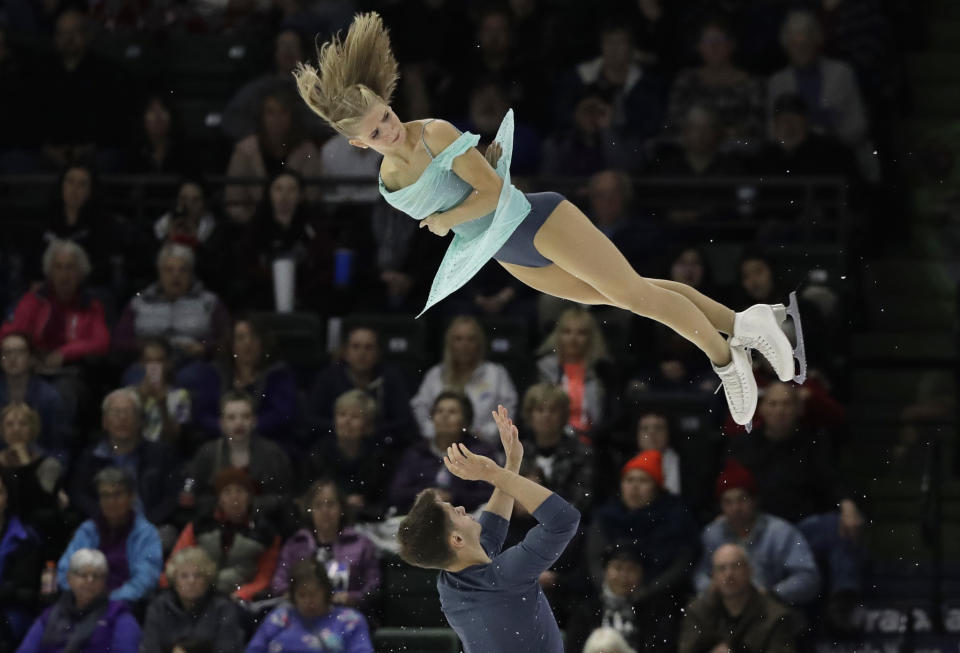 Minerva Fabienne Hase, top, and Nolan Seegert, of Germany, perform during the pairs short program at Skate America, Friday, Oct. 19, 2018, in Everett, Wash. (AP Photo/Ted S. Warren)