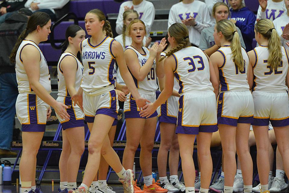 Watertown's Emery Thury goes through the line after being announced as a starter prior to a high school girls basketball game against Sioux Falls Washington on Friday, Feb. 2, 2024 in the Watertown Civic Arena. Washington won 46-41.