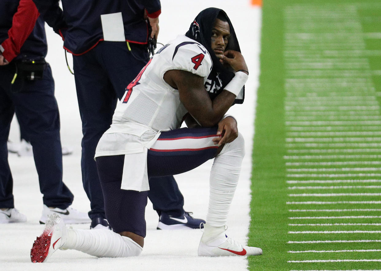 HOUSTON, TEXAS - SEPTEMBER 20: Deshaun Watson #4 of the Houston Texans looks on from the sidelines against the Baltimore Ravens during the second half against the Baltimore Ravens at NRG Stadium on September 20, 2020 in Houston, Texas. (Photo by Bob Levey/Getty Images)