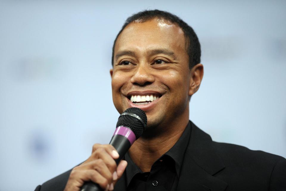 Tiger Woods speaks during a news conference at the Newseum in Washington, Monday, March 24, 2014, during an announcement that Quicken Loans had signed a multi-year agreement to become the title sponsor of the Quicken Loans National to be played at Congressional in Bethesda, Md., in June. (AP Photo/Susan Walsh)