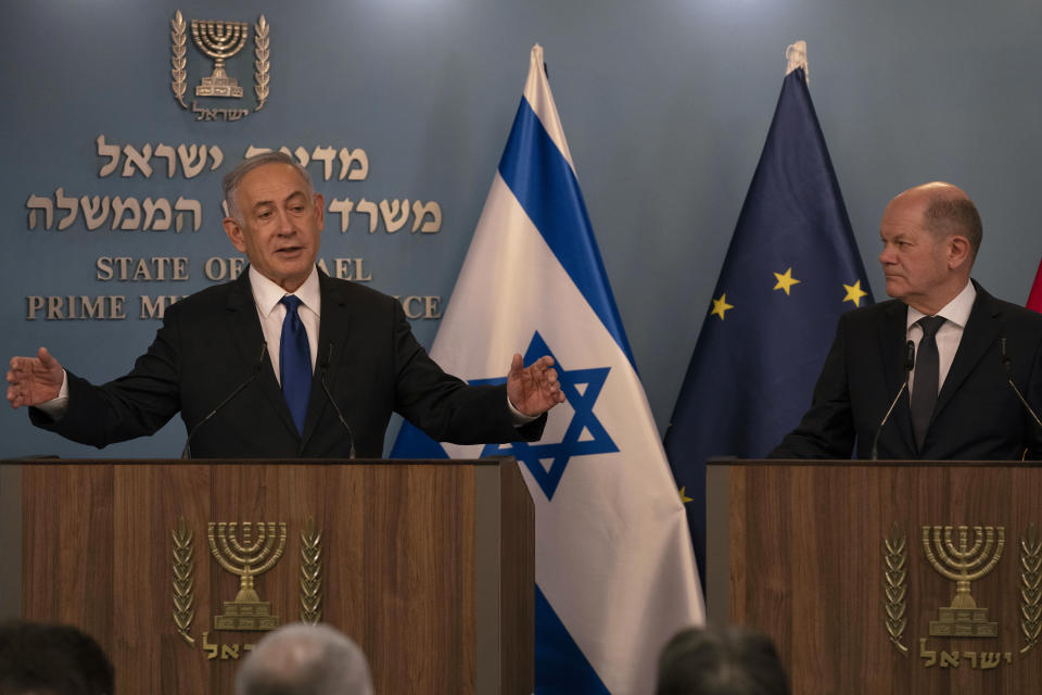 Israeli Prime Minister Benjamin Netanyahu, left, delivers his speech after a meeting with German Chancellor Olaf Scholz in Jerusalem, Sunday, March 17, 2024. (AP Photo/Leo Correa, Pool)
