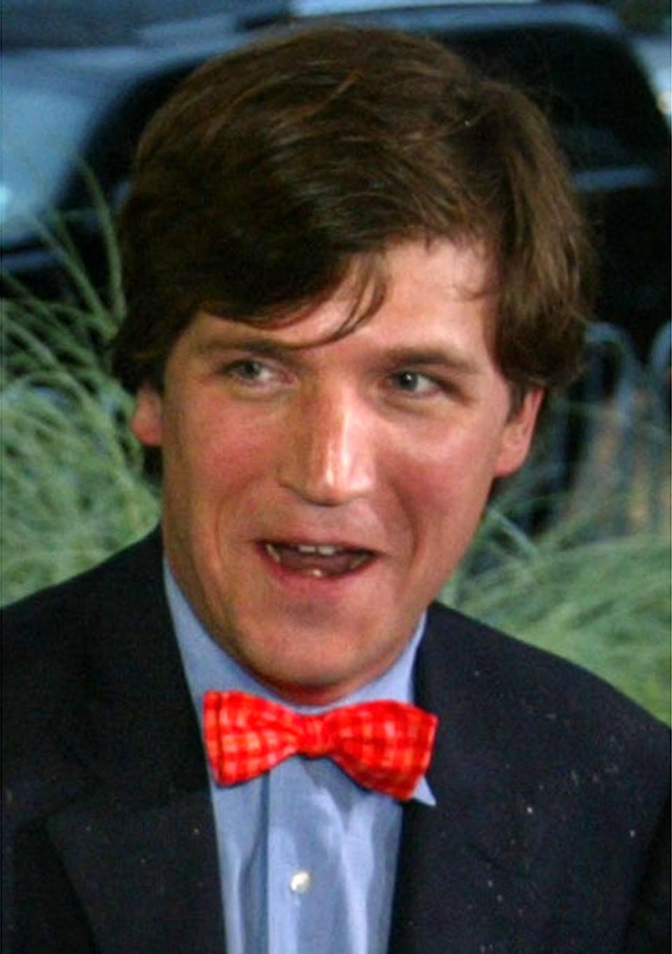 CNN's "Crossfire" panelist Tucker Carlson attends the premiere of the television show "K Street" in Washington, Friday, Sept. 12, 2003.
