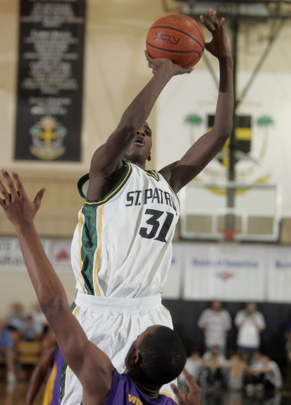 St Patrick's Michael Gilchrist shoots against Word of God at the 36th Annual City of Palms Classic at Bishop Verot High School on Saturday Dec. 20, 2008.