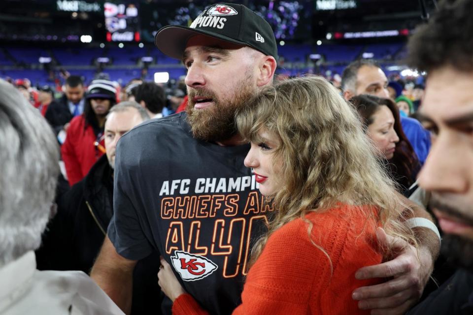PHOTO: Travis Kelce of the Kansas City Chiefs celebrates with Taylor Swift after a 17-10 victory against the Baltimore Ravens in the AFC Championship Game in Baltimore, MD, Jan.28, 2024. (Patrick Smith/Getty Images)
