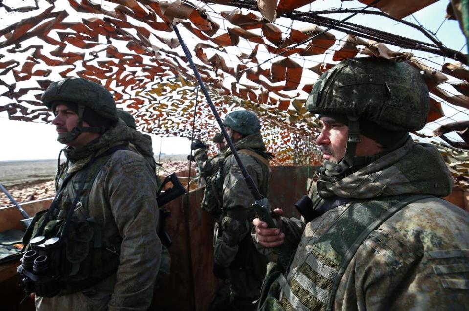 Russian Servicemen are seen at a command point during an exercise held by units of the Russian Airborne Troops at Opuk range.