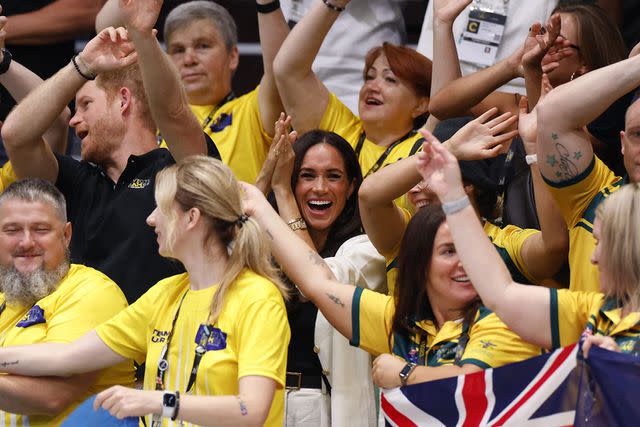 <p>ODD ANDERSEN/AFP via Getty</p> Prince Harry and Meghan Markle at the 2023 Invictus Games