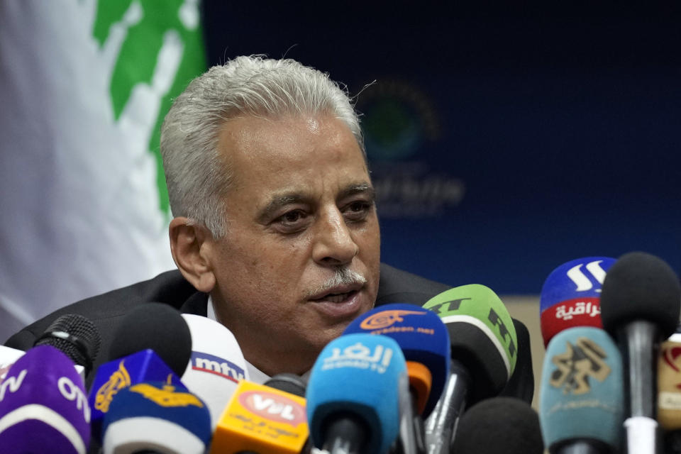 Director General of the Syrian General Petroleum Corporation Nabih Khrestin, speaks during a press conference with Lebanon's Energy Minister Walid Fayyad, and Egyptian ambassador to Lebanon Yasser Elwi, after they signed deals to bring gas from Egypt through Syria to Lebanon, at the Ministry of Energy and Water in Beirut, Lebanon, Tuesday, June 21, 2022. (AP Photo/Bilal Hussein)