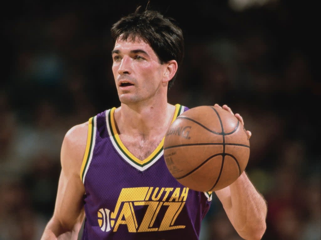 John Stockton in action for Utah Jazz against the Portland Trail Blazers on 24 February 1995 (Otto Greule Jr/Allsport/Getty)