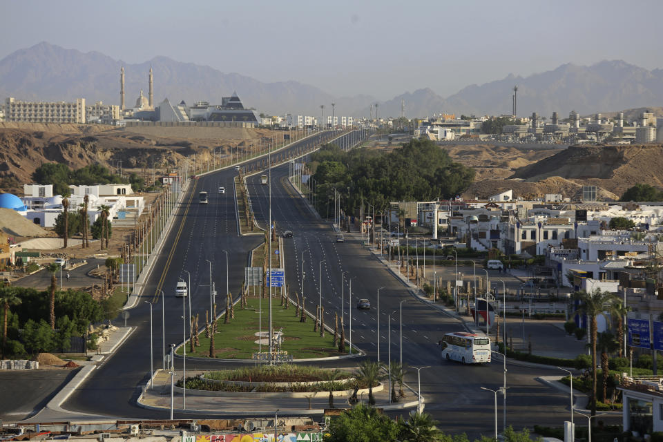 A 10-lane highway, part of the refurbishing of the city for this year’s United Nations global summit on climate change, known as COP27, in Sharm el-Sheikh, South Sinai, Egypt, Oct. 19, 2022. As this year’s United Nations climate summit approaches, Egypt’s government is touting its efforts to make Sharm el-Sheikh a more eco-friendly tourist destination. (AP Photo/Thomas Hartwell)