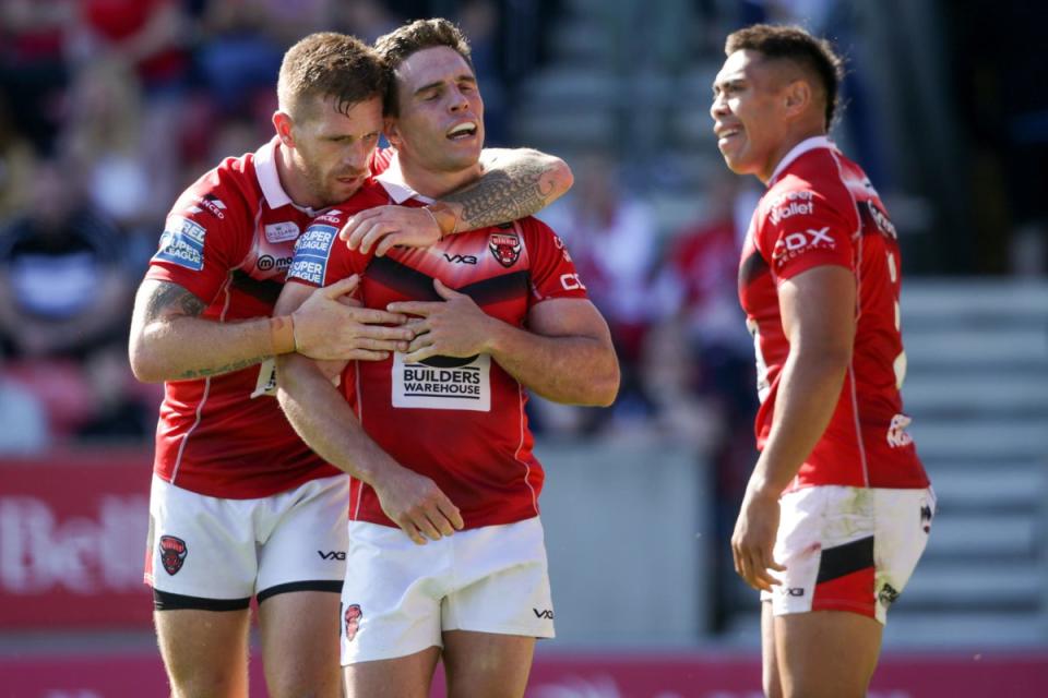 Brodie Croft, centre, has signed a new long-term deal with Salford Red Devils (Ian Hodgson/PA) (PA Archive)