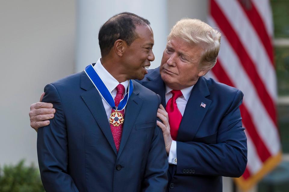 Tiger Woods receives a personal congratulations from President Donald Trump during a ceremony on May 6, 2019, in the Rose Garden.