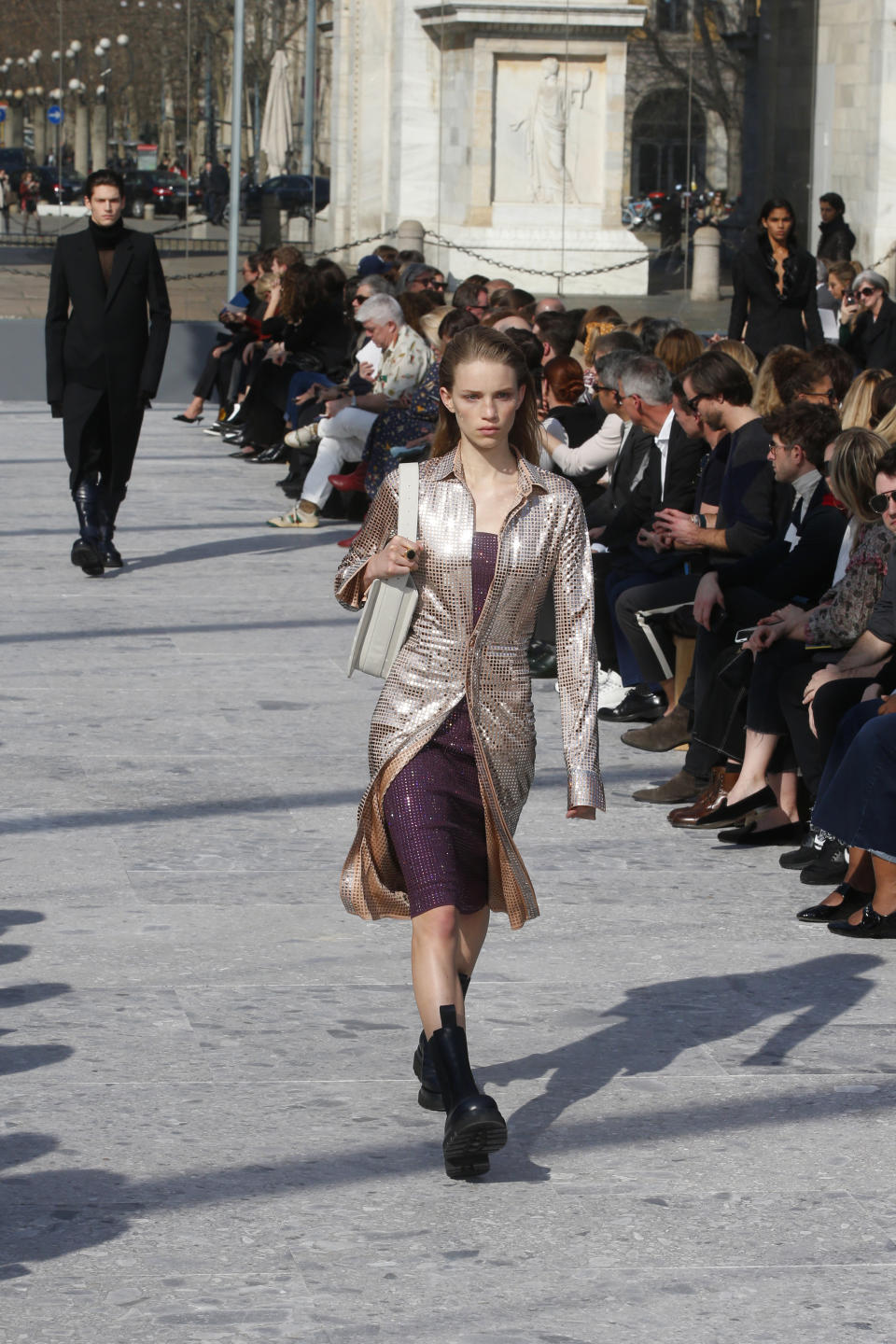 A model wears a creation as part of the Bottega Veneta women's Fall-Winter 2019-2020 collection, that was presented in Milan, Italy, Thursday, Friday, Feb. 22, 2019. (AP Photo/Antonio Calanni)