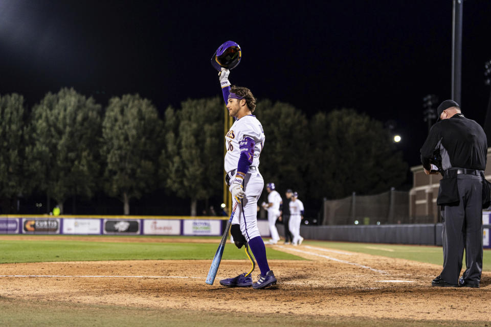 This photo provided by East Carolina University shows Parker Byrd during an NCAA college baseball game against Rider, Friday, Feb. 16, 2024 in Greenville, N.C. East Carolina sophomore Parker Byrd appeared in Friday’s season-opening win against Rider with a prosthetic leg after having part of his right leg amputated following a 2022 boating accident. The school said he is the first NCAA Division I athlete to play in a game with a prosthetic leg. (East Carolina University via AP)