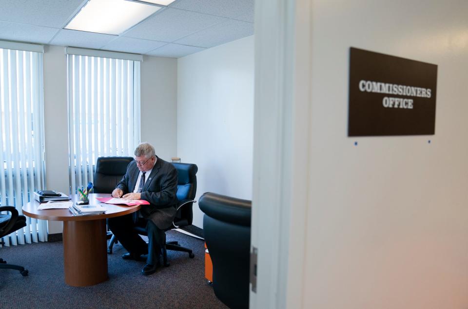 Chairman of the Newaygo County Board of Commissioners Bryan Kolk, 62, of Fremont, works on county business in the administration building in White Cloud on Wednesday, May 8, 2024.