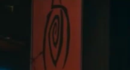 A banner with The Eye of the Crimson King in "The Stand" (2020)