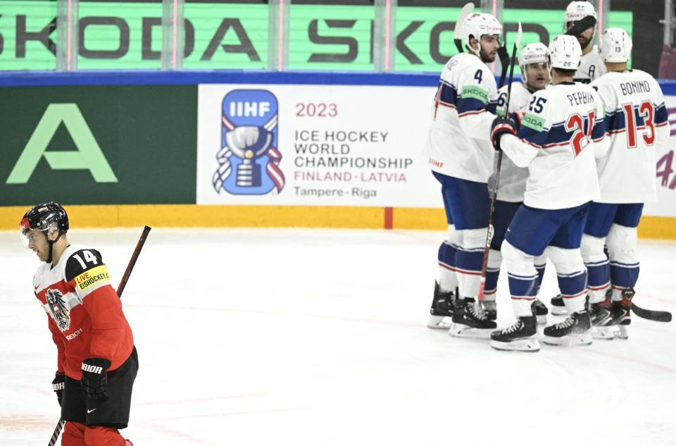 US players celebrate during the IIHF World Championships Group A match between Team USA and Austria in Tampere, Finland, on Wednesday, May 17, 2023.