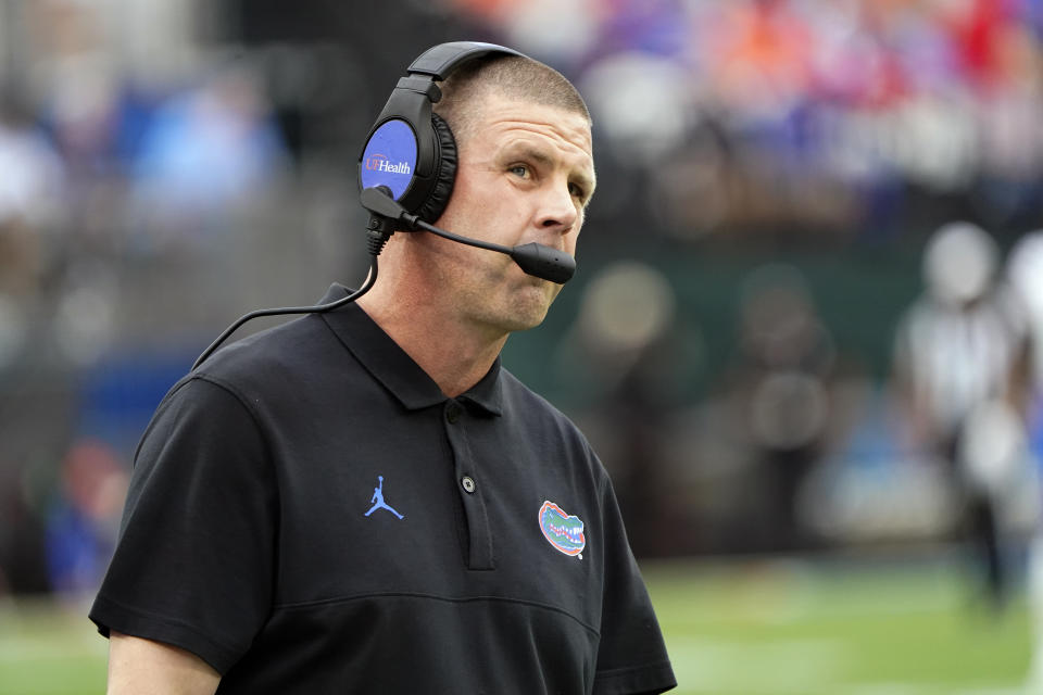 Florida head coach Billy Napier looks up at the monitor during the first half of an NCAA college football game against Georgia Saturday, Oct. 29, 2022, in Jacksonville, Fla. (AP Photo/John Raoux)