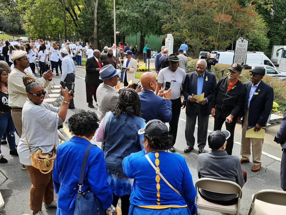 In this file photo, former George Fish School students take photos with former school staff members during a 2022 historical marker dedication for the school that served Black students in Fort Mill prior to school integration. A new early childhood learning center in Fort Mill also will have the George Fish name.