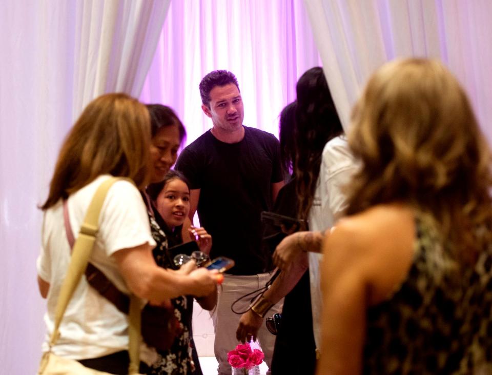 General Hospital and Hallmark Channel film star Ryan Paevey does a meet and greet with fans during RomaDrama, a festival featuring stars from Hallmark movies, rom-coms and soap operas at the Palm Beach County Convention Center June 25, 2022 in West Palm Beach. MEGHAN MCCARTHY/The Palm Beach Post