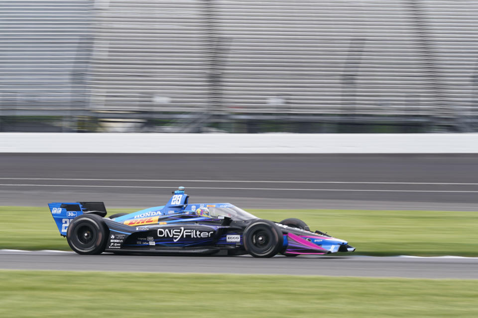 Romain Grosjean, of Switzerland, drives into a turn during practice for the IndyCar Grand Prix auto race at Indianapolis Motor Speedway, Friday, May 12, 2023, in Indianapolis. (AP Photo/Darron Cummings)