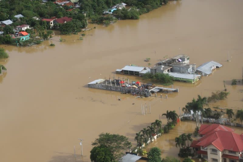 Buildings are flooded in the aftermath of Typhoon Vamco, in the Cagayan Valley region