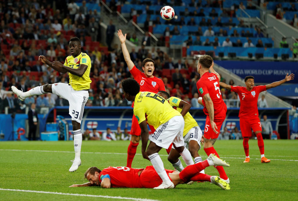<p>PENALTY! Colombia’s Carlos Sanchez concedes a penalty for hauling Harry Kane to the ground in the box </p>