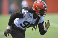 Cleveland Browns defensive linemen Jadeveon Clowney participates in a drill during an NFL football practice at the team training facility, Tuesday, June 15, 2021 in Berea, Ohio. (AP Photo/David Dermer)