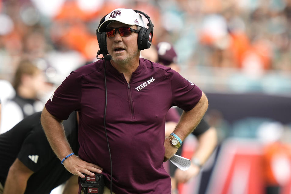 Texas A&M head coach Jimbo Fisher watches during the first half of an NCAA college football game against Miami, Saturday, Sept. 9, 2023, in Miami Gardens, Fla. (AP Photo/Lynne Sladky)