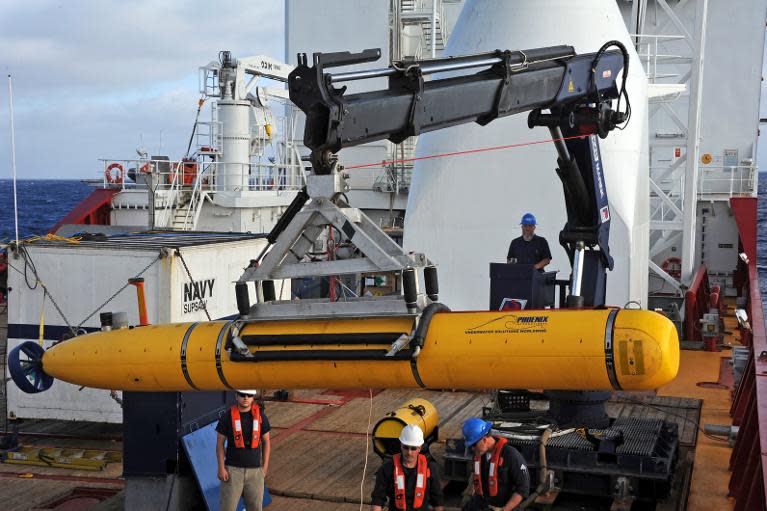 This handout image taken on April 14, 2014 shows US Navy operators aboard ADF Ocean Shield moving the Bluefin-21 into position for deployment in the search of missing Malaysia Airlines flight MH370