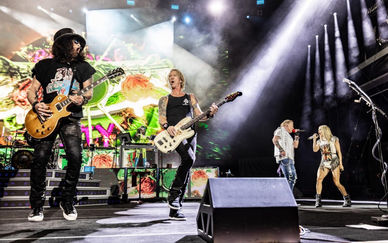 From left: Slash, Duff McKagan, Axl Rose and Carrie Underwood - Jeff Johnson