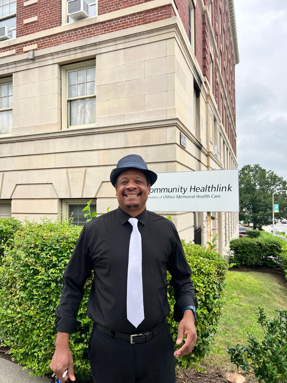 Edson Montero stands outside the Family Health Center of Worcester.