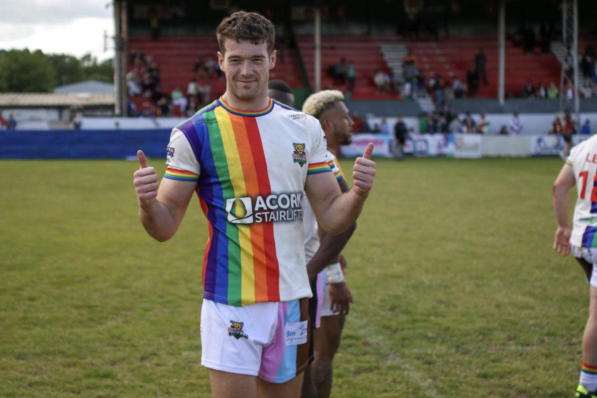 Nathan Roebuck celebrates Cougars' win over West Wales Raiders in the 2022 Pride fixture. <i>(Image: JT Sports Media.)</i>