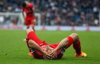 Liverpool's Croatian defender Dejan Lovren reacts after missing a final minute chance on goal during their English Premier League football match against West Bromwich Albion in West Bromwich, England on April 25, 2015