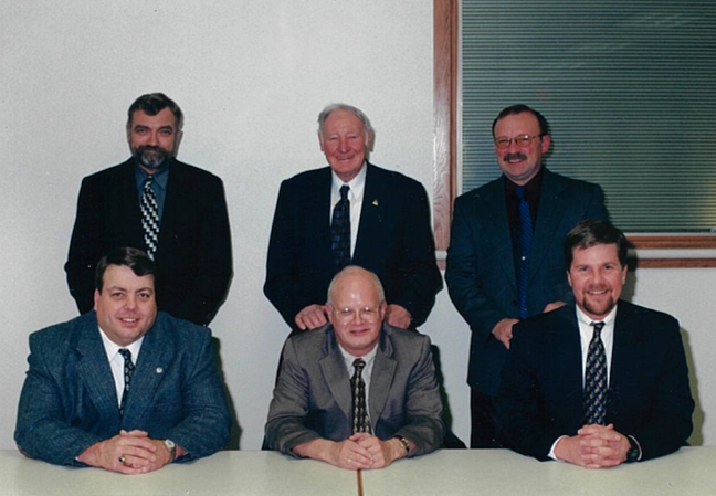 The Sheboygan County Executive Committee in 2000, including Adam Payne in the bottom right. Clockwise from Payne, the photograph includes former Supervisor Daniel LeMahieu, former Supervisor Mark Winkel, Supervisor William Goehring, former Supervisor William Jens, and Supervisor Roger Te Stroete