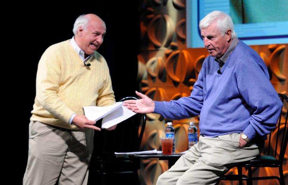 Billy Packer, left, and Bob Knight joke with each other during a 2011 event in Charlotte.