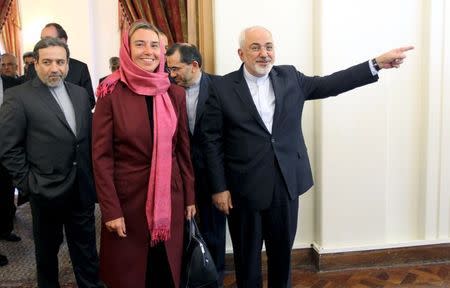 Iran's Foreign Minister Mohammad Javad Zarif (R), European Union foreign policy chief Federica Mogherini (C) and Iran's chief nuclear negotiator Abbas Araghchi (L) arrive for a meeting in Tehran July 28, 2015. REUTERS/Raheb Homavandi/TIMA