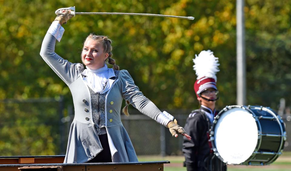 A member of the Clements High School color guard swings a sword during the 59th annual Midsouth Marching Festival on Sept. 30, 2023, at Gadsden City High School's Titan Stadium. Clements' band received all 1's in the scoring in Class 1A. Thirty-one high school bands from three states competed in the event, which also featured exhibition performances by host Gadsden City and Jacksonville State University's Marching Southerners.