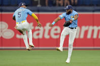 Tampa Bay Rays shortstop Wander Franco (5) celebrates with center fielder Manuel Margot after the team defeated the Chicago White Sox during a baseball game Sunday, April 23, 2023, in St. Petersburg, Fla. (AP Photo/Chris O'Meara)