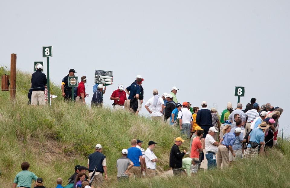 South Bend Tribune/ ROBERT FRANKLIN  Large crowds follow golfers around the course during the third round of the Senior PGA Championship at Harbor Shores in Benton Harbor on Saturday, May 26, 2012.