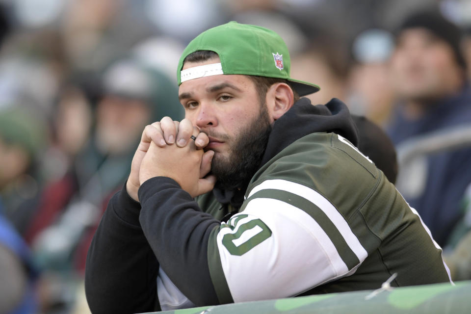 A New York Jets fan looking disgruntled, which isn't unusual. (AP)