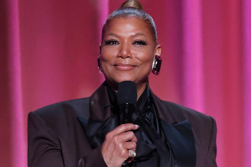 <p>John Salangsang/Variety via Getty</p> Queen Latifah hosting the 55th NAACP Image Awards.