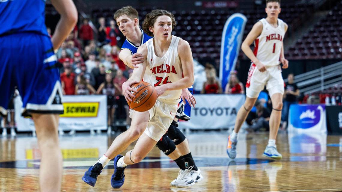 Melba senior Braden Volkers dribbles in the first half of the 2A boys basketball championship game against Bear Lake held at Ford Idaho Center, Saturday, March 4, 2023. Bear Lake defeated Melba 55-44.